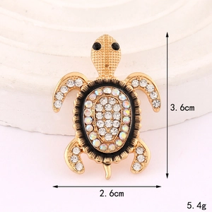 Sparkling crystal sea turtle brooch in gold metal with colorful rhinestones on shell
