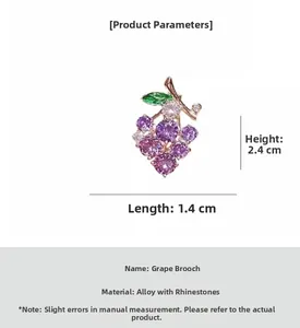 Detailed view of grape-shaped pin with dimensions 2.4cm by 1.4cm and purple rhinestones