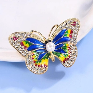 Luxury butterfly brooch with colorful enamel wings, sparkling crystals and pearl accent