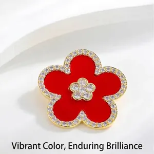 Elegant red five-petal flower brooch with gold plating and sparkling crystal accents