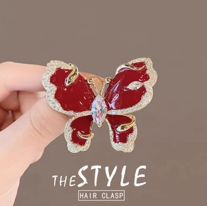 Sparkling red enamel butterfly hair clasp with white rhinestones and gold alloy base