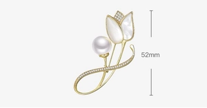 Detailed view of tulip brooch with white petals, pearl and 52mm size measurement
