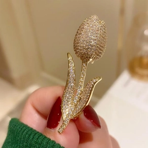 Elegant French tulip bouquet brooch with gold plating and cubic zirconia inlays