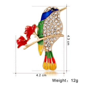 Broche colibri colorée avec strass et branche fleurie, dimensions 4,3 cm sur 4,2 cm