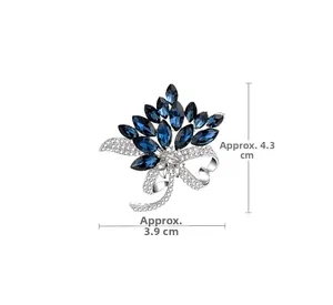 Detailed close-up showing 3.9cm x 4.3cm dimensions of blue crystal floral brooch