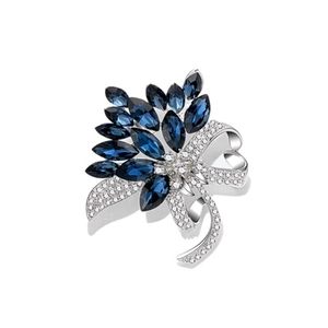 Elegant silver-tone flower bouquet brooch with navy blue gems and crystal accents