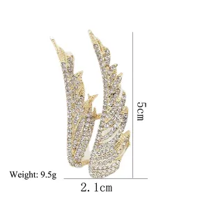 Sparkling crystal wing ear cuff in gold finish, dimensions 5cm height by 2.1cm width