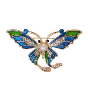 Spilla a farfalla vintage in smalto con ali blu, perla bianca e strass azzurri