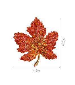 Detailed size view of red maple leaf brooch with orange crystals, 5.2cm height by 4.7cm width