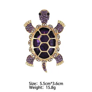 Exquisite gold-tone turtle brooch with purple rhinestones, 5.5cm x 3.6cm size
