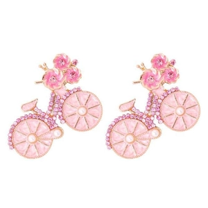 Roze en gouden fietsbroche met fonkelende strass-steentjes en parels op een witte achtergrond