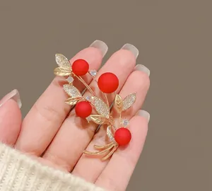 Elegant red berry brooch with gold leaves and sparkling rhinestones for women coats