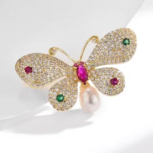 Elegant butterfly brooch with colorful gemstones, sparkling crystals and water-drop pearl