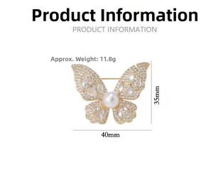 Detailed view of luxury butterfly brooch with dimensions 40mm by 35mm and pearl accent