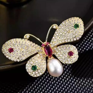 Elegant butterfly brooch with gold plating, colorful zircons, and a drop pearl pendant
