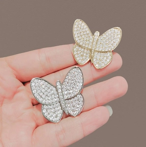 Exquisite gold and silver butterfly brooches with pavé crystal rhinestones for women
