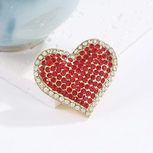 Elegant heart brooch with red and white rhinestones on a gold metal base jewelry accessory