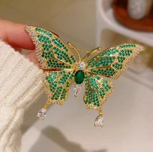 French vintage butterfly brooch with emerald green stones and gold plated zircon accents