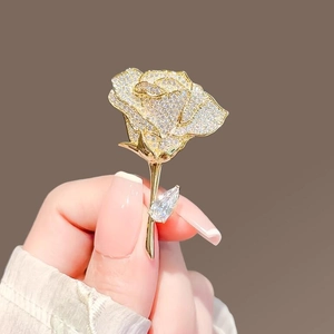 Exquisite gold rose brooch with full micro-pave diamonds and pear-cut zircon leaf