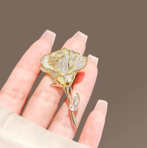 Exquisite gold rose brooch with sparkling micro-pave crystals and pear-cut zircon stone