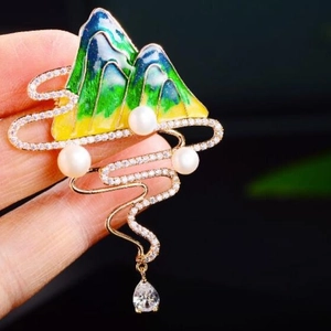 Elegant landscape brooch with enamel mountain, pearls and teardrop gemstone pendant