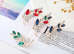 Elegant rose gold leaf brooches with rhinestones and colored marquise crystals