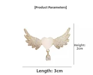 Parametri dimensionali della spilla a cuore ala d'angelo con finitura in oro e zircone