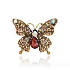 Vintage Schmetterling Brosche in Bronze mit braunen Diamanten und rotem Edelstein