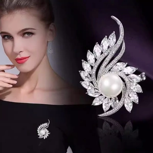 Elegant floral silver brooch with white pearl and sparkling zircon crystals for women