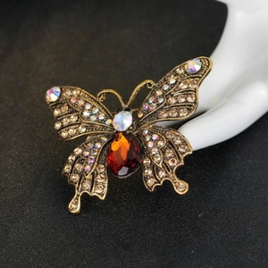 Vintage Schmetterlingsbrosche in Gold mit Champagner-Kristallen und Bernstein-Edelstein