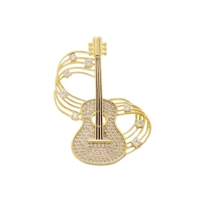 Broche guitare dorée exquise sertie de cristaux et lignes fluides de notes de musique