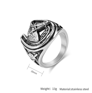Detail shot of vintage stainless steel horseshoe and horse head ring with size measurements