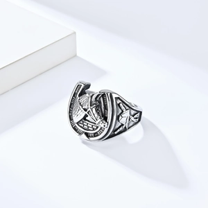 Detailed relief of horse head and horseshoe engraving on vintage stainless steel ring