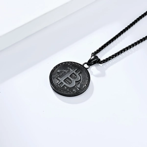 Macro view of matte black Bitcoin pendant necklace with detailed engraved coin edges