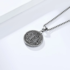 Macro shot of silver Bitcoin pendant with circuit board texture and steel box chain