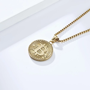 Close-up of 18K gold plated Bitcoin pendant showing intricate circuit board textures