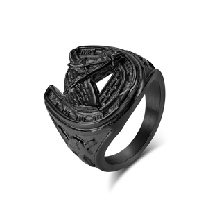 Retro black stainless steel ring featuring a detailed horse head and horseshoe relief design