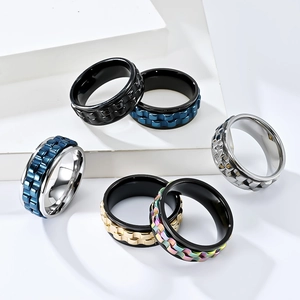 Rotating gear spinner rings for anxiety relief in assorted polished stainless steel finishes