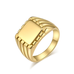 Minimalist square signet gold ring with vertical side grooves on a white background