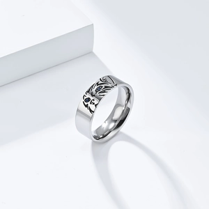 Titanium steel animal ring featuring minimalist tiger line art and blue zircon eyes