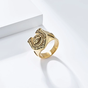 Retro horseshoe evil eye signet ring in gold finish with vintage relief patterns