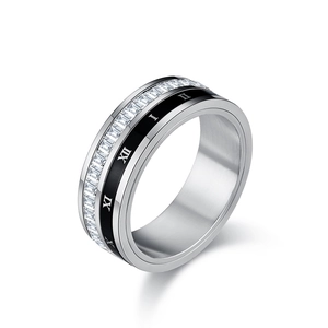 Bague rotative en acier titane avec diamants baguette et chiffres romains