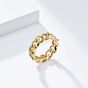 Detailed view of a polished gold Cuban link ring made of durable titanium steel