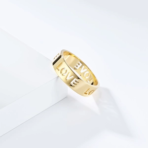6mm wide golden titanium steel ring with hollow LOVE cutouts and polished mirror finish
