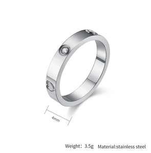 Detailed close-up of 4mm stainless steel ring with engraved heart and zircon stone