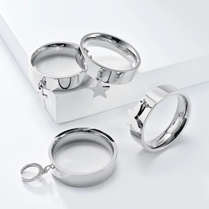 Minimalist stainless steel ring set with star, moon, butterfly and cross pendants
