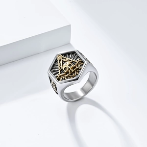 Macro detail of bicolored Masonic skull ring with gold compass and square emblem