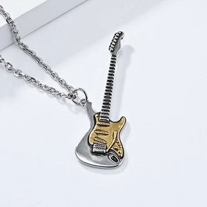 Close-up of guitar pendant necklace with detailed silver body and golden pickguard