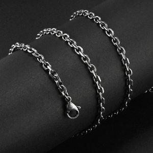 Vintage stainless steel cable chain necklace with lobster clasp on black background