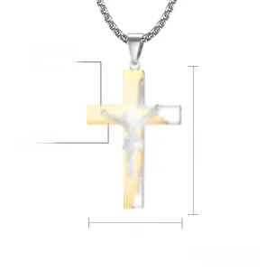 Detail view of high polished two-tone stainless steel cross pendant with measurements